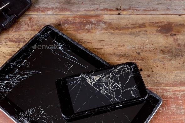Broken glass screen on the touch screen electronic device smart phone and tablet