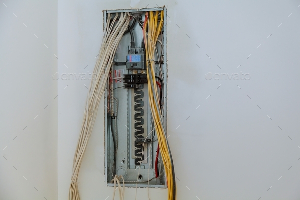 electrical box contains many terminals, relays, wires and switches