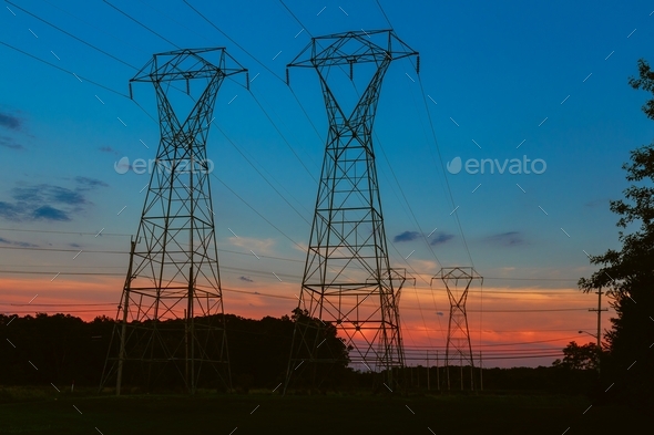 Pink night sky electrical Electricity cable communication towers on sunset stretching