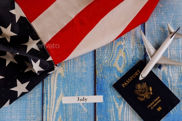 July month of calendar year, travel tourism, emigration the USA American national flag with U