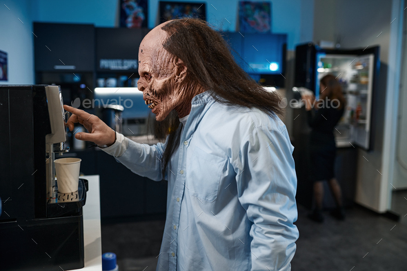 Zombie worker making coffee using vending machine