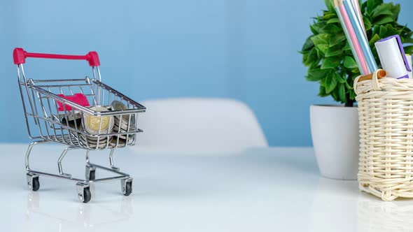 Money stack on shopping cart,Money saving and economy concept, 4K stop motion