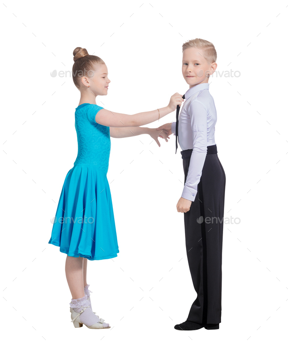 Sports ballroom dancing. Couple of kids, boy and girl  on isolated white background - Stock Photo - Images
