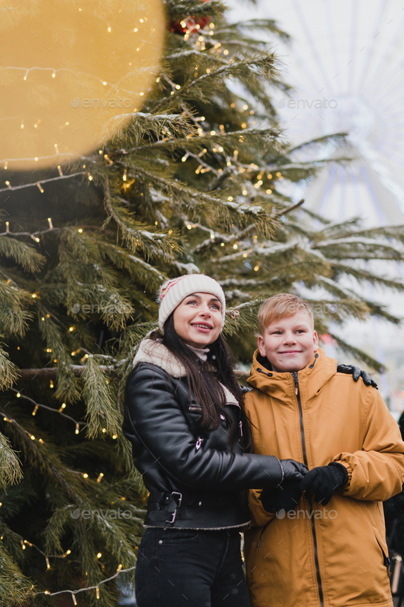 Boy In A Cold Winter Day Outdoors In Warm Clothes Stock Photo