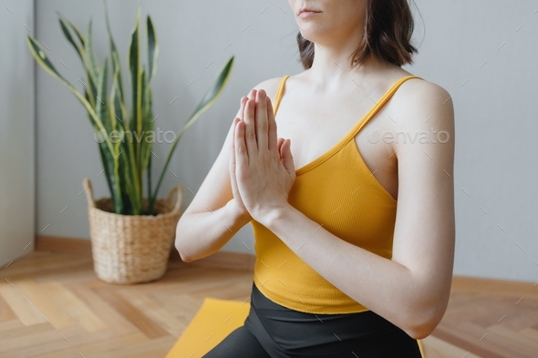 yoga, caucasian woman meditates and does breathing practice. european woman does yoga and meditation