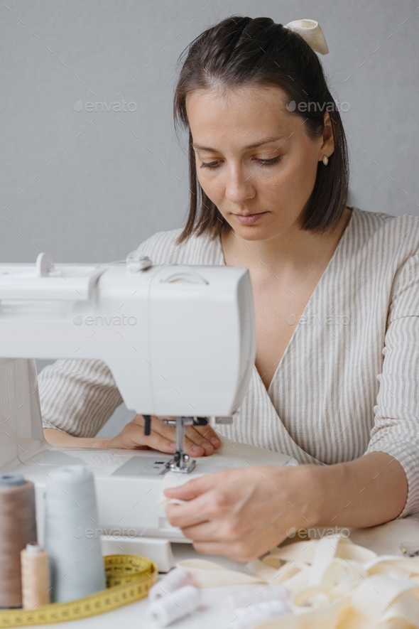  woman does what she loves and sews. small business and self-employment