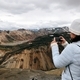 girl taking a photo of mountains  - PhotoDune Item for Sale