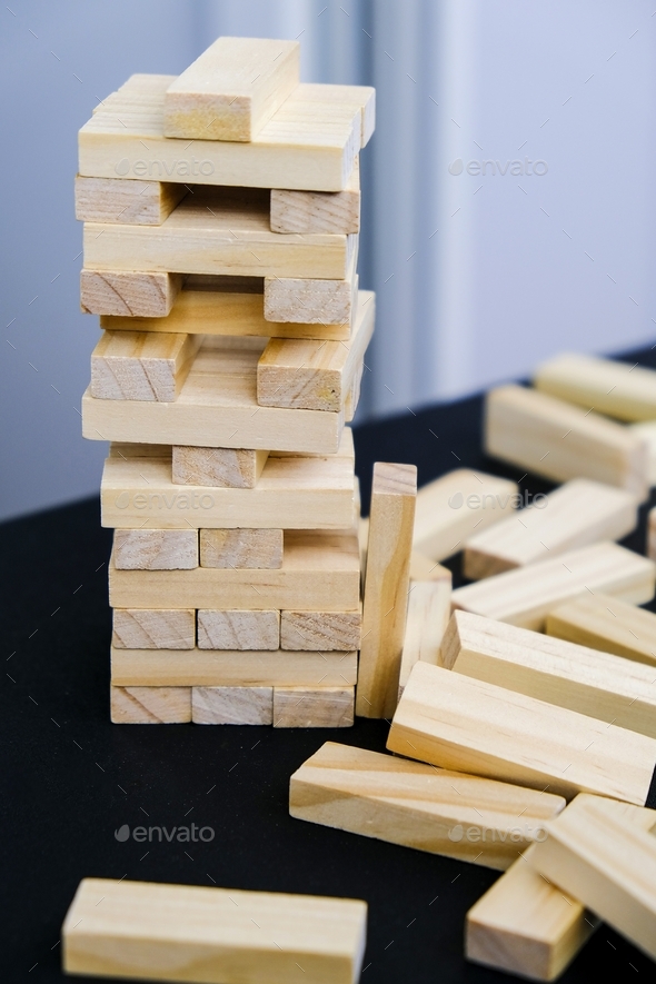 Building from wooden blocks. Game for family of wooden bars. Wood