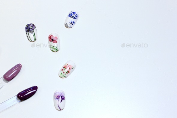 Background of multicolored nail polish samples. Fashion manicure. Nail design.