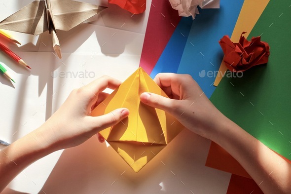 Concept of children\'s creativity, origami, back to school.