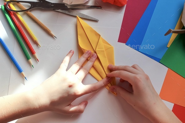 Concept of children\'s creativity, origami, back to school.
