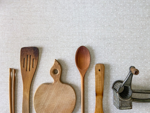 Wooden old kitchen tools on the neutral backdrop - Stock Photo - Images