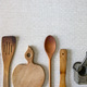 Wooden old kitchen tools on the neutral backdrop - PhotoDune Item for Sale