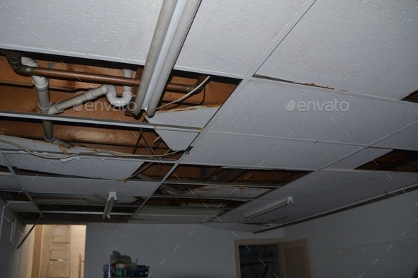 Water damage to a drop ceiling due to a fire. Time to file an insurance claim.