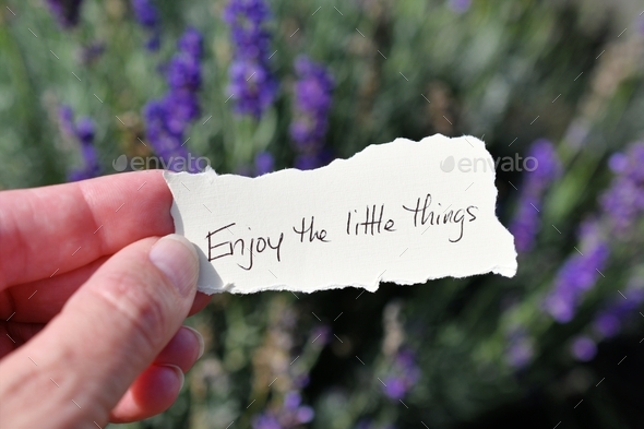 Handwritten message Enjoy the little things - note, quote, words of encouragement