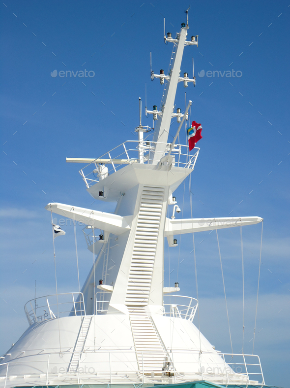 Cruise ship crossbeam with naval flags  - Stock Photo - Images