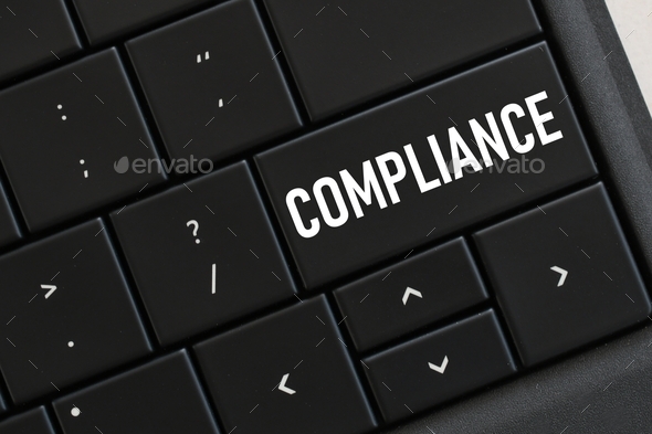 Computer keyboard with a COMPLIANCE button. Concept - changing procedures to adhere to regulations - Stock Photo - Images
