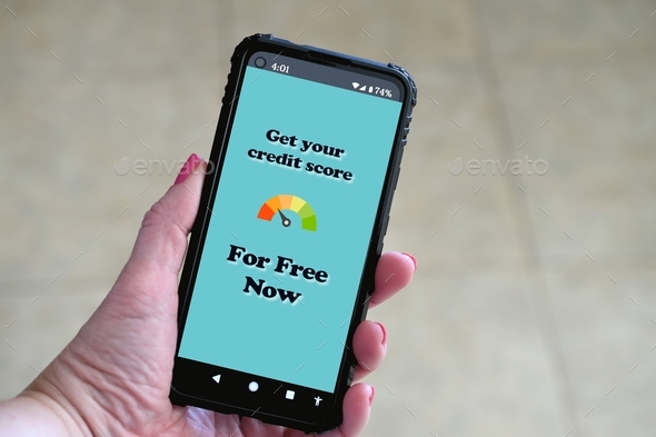 Get Your Free Credit Score website on a mobile phone cellular device screen in a woman's hand.