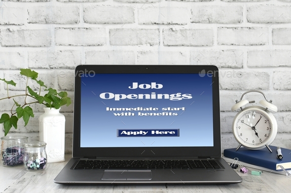 Job Openings with benefits Apply Here - Online Job Search on laptop computer screen bright desk