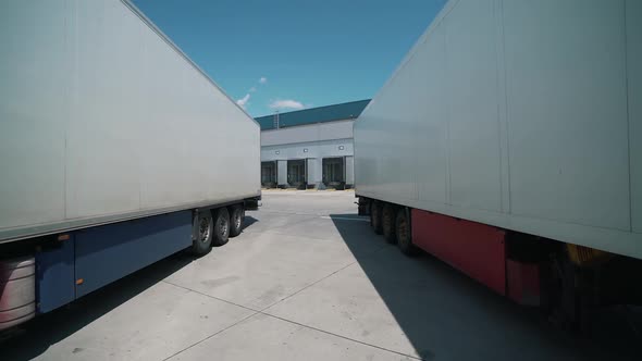 Trucks Are Parked for Unloading at the Logical Center