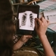 Girl analyzing a chest radiography on a tablet
 - PhotoDune Item for Sale