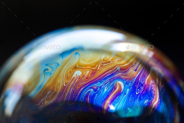 Abstract pattern, texture inside of the soap bubble, macro photography. Bubble world.