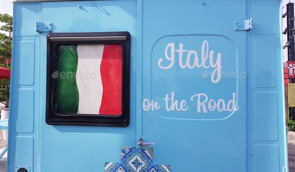 Food truck colored in blue. Italy on the road.