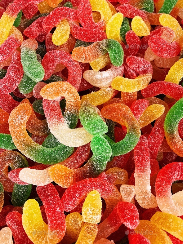 Colorful Halloween Candy In Bulk. Gummy Worms Stock Photo By Juliealexk