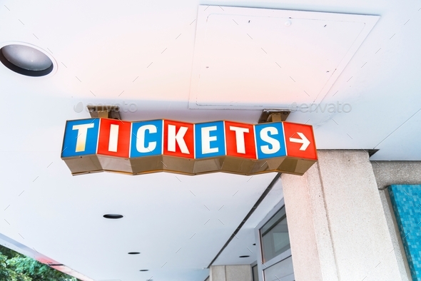 Colorful sign spelling out tickets sign to attend - Stock Photo - Images