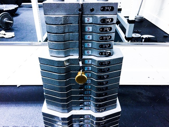 Gym equipment weight stack. Stock Photo by RLTheis | PhotoDune