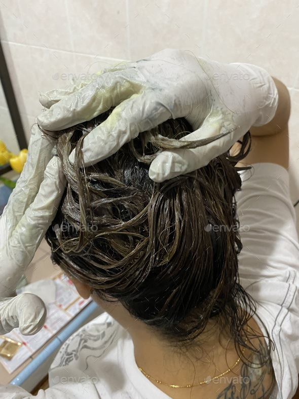 Dyeing hair at home Stock Photo by weewendy PhotoDune