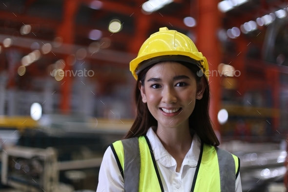 woman worker working in factory of heavy work industry workplace. Stock ...