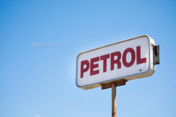 Petrol fuel sign blue sky - Stock Photo - Images