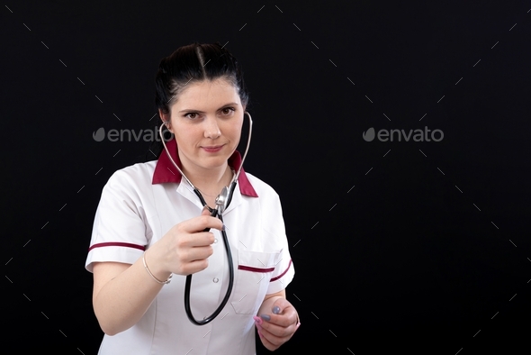 headshot portrait of nurse in uniform with stethoscope, isolated on