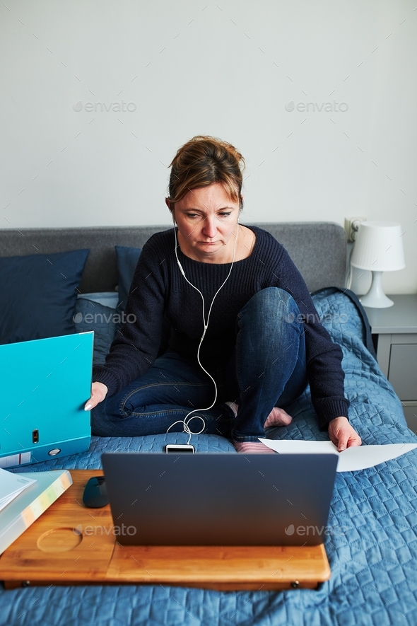Woman working doing her job remotely during video chat call online course from home