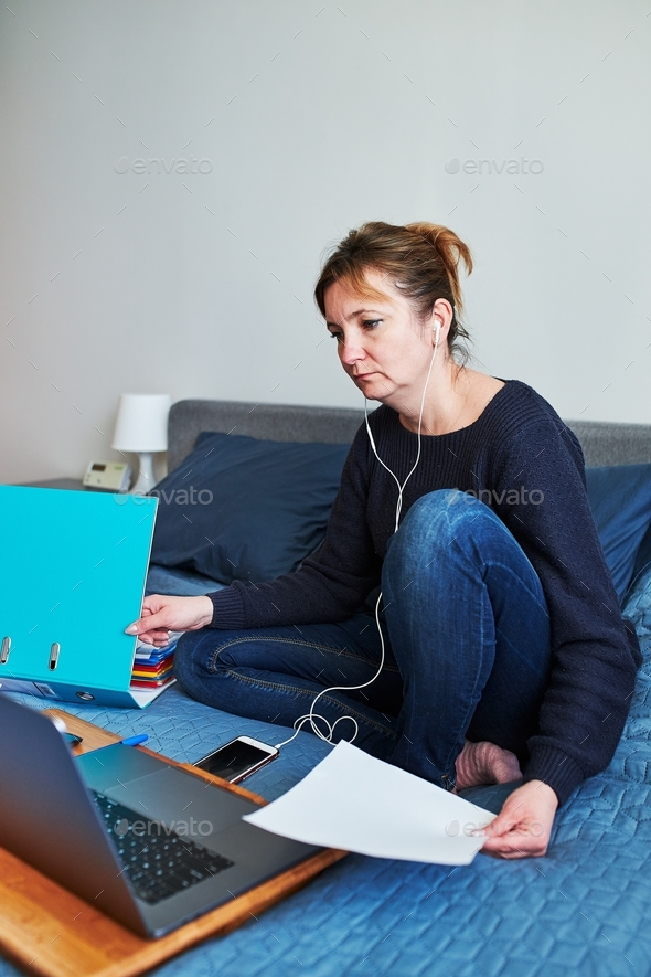 Woman working doing her job remotely during video chat call online course from home