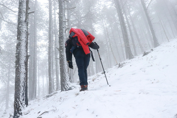 Snowing and hiking  - Stock Photo - Images