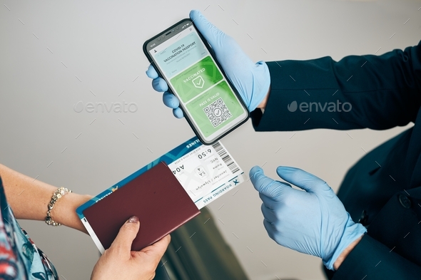 Digital covid certificate. Covid negative test. Woman passenger holding ...