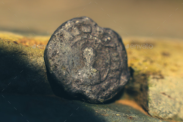 Macro of an ancient stamp from 10th century  - Stock Photo - Images