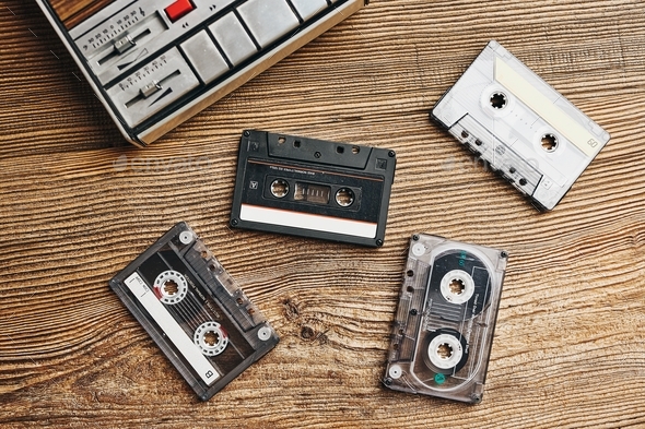 Cassette tapes and recorder. Retro music style. 80s music party. Back to the past. Analog sound