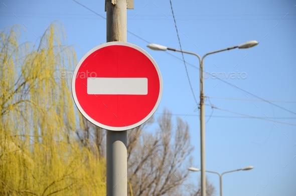 Road sign in the form of a white rectangle in a red circle. No entry