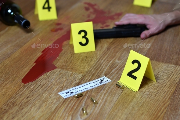 Bloody crime scene with dead body and gun on floor