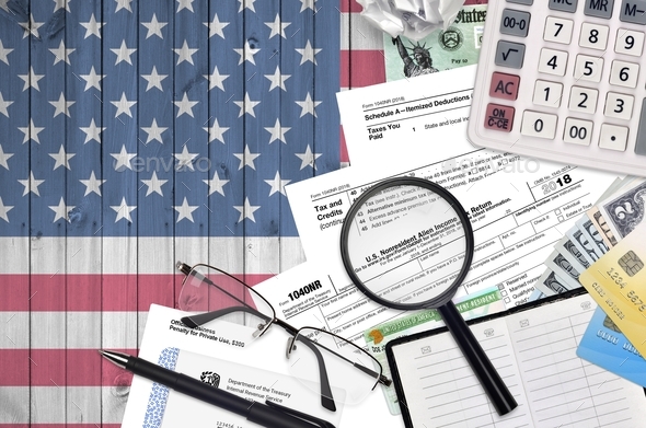 irs-form-1040nr-nonresident-alien-income-tax-return-lies-on-flat-lay