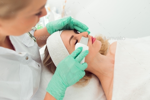 Ultrasound cosmetology scrubber. Face cavitation procedure - Stock Photo - Images