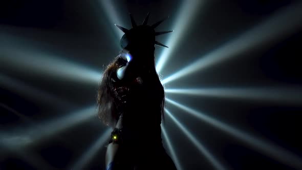 Bottom View of a Sexy Woman Dancing Dynamically. Brunette with Long Hair in a Sexy Costume American alt