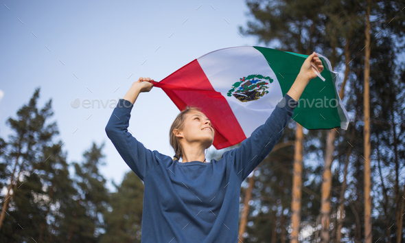 People holding flag of Mexico. Independence Day of Mexico. Mexican War of Independence, 1810.\