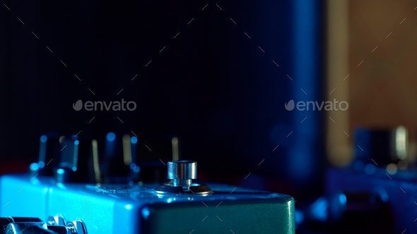 Close up of guitar pedal. music effect loop machine. Macro view
