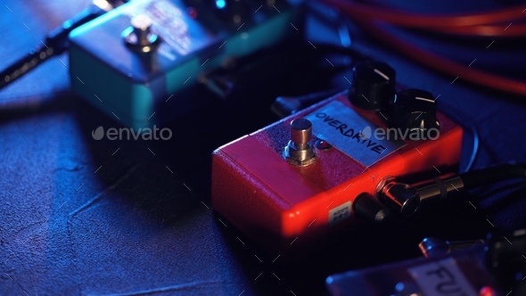 Close up of guitar pedals. music effect loop machine. Macro view