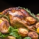  Roasted chicken with grilled potatoes and onion, yellow tomatoes, fresh green salad on wooden table - PhotoDune Item for Sale
