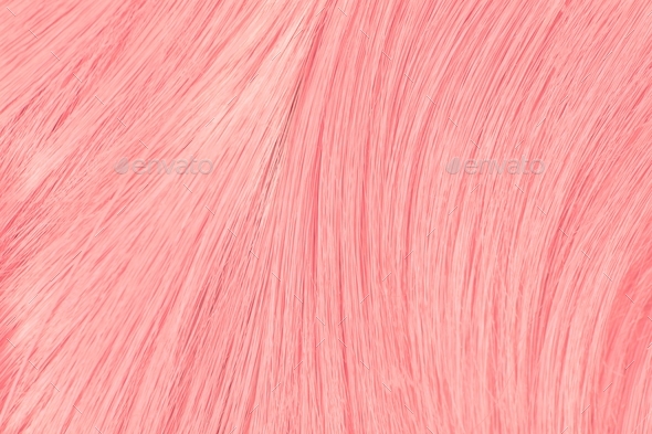 Texture of pastel peachy pink hair or wool. Abstract background, pinky, glamour